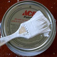 Paint can spruce up a fireplace.