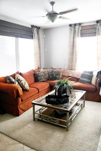 For maximum light blocking, cover light gaps on either sides of window shades or blinds with drapery panels.