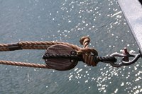 Pulleys can be combined into systems that make lifting easier.
