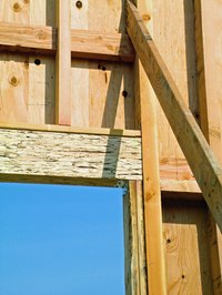 Headers support the space over windows and doors in standard house framing.