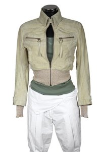 Remove stains from a white leather jacket with household products.