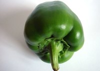 Brown spots on your green peppers could indicate a disease or water shortage.