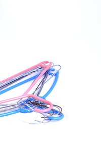 Measure and bend a wire hanger to form a homemade plate stand.