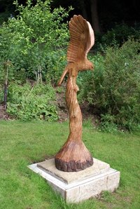 Wooden statues are cleaned with soap and water.