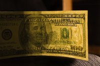 Currency includes watermarks to prevent counterfiting.