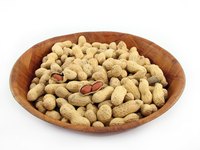 Roasting raw peanuts makes them crunchy and flavorful.