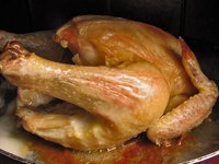 The juices at the bottom of the baking pan add flavor to chicken gravy.