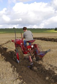 A single-bottom plow is the right piece of equipment for ditches and diversions.