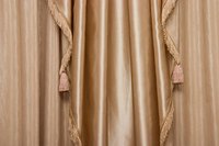 Elegantly pleated draw drapes are easy to make.