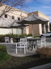 Clean plastic furniture with washing or baking soda.