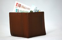 Credit economics examines borrowing and lending in the economy.