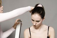 A cosmetology school teaches students to style hair.