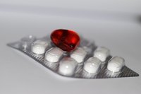 Garlic tablets are used for multiple medicinal purposes besides lowering cholesterol, such as lowering blood pressure and reducing the risk of blood clots.