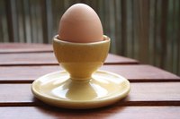 Hard-boiled eggs should be cooled immediately and then cracked on a hard surface.