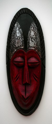 Many folk artists imitate the features on a Zulu mask.