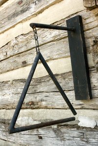 Add a touch of nostalgia to your yard by adding a dinner bell.