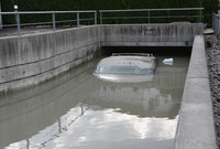 A submerged flooded car may be covered by insurance.