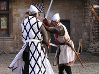 Renaissance men wore loose fitting tops cinched at the waist.