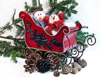 Paint your sleigh using traditional Christmas colors.
