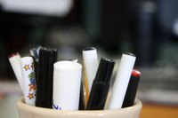 Keep pens and other writing utensils together to make them easier to find in the office supply closet.