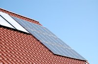 A large solar installation mounted on a roof can contribute substantially to the power used by a residence.