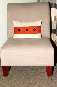 Mildew can be removed from upholstered chairs at home with the right tools.