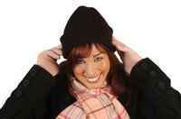 Entice seasonal shoppers with a creative display of winter hats, gloves and scarves.