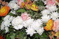 Mass floral arrangements are common table centerpieces.