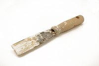 Putty knives are valuable tools when removing silicone rubber.
