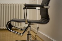 An ergonomic office chair can help reduce the chances of back injury.