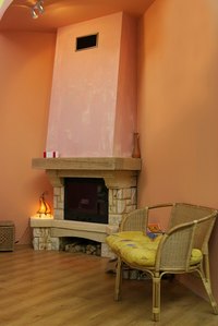 Use a decorative mantel to hide the chimney vent.