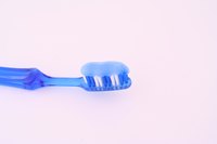A toothbrush will clean bacteria and plaque from your tongue.