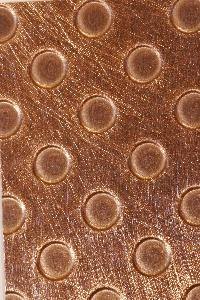 A copper backsplash is an alternative to a tile or other material backsplash.