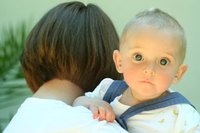 Playing with children and infants can be a large part of an assistant's job.