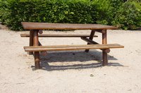 Sandblast an old table to speed refinishing time.