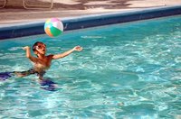 Enjoying playing in a nice, clean pool.