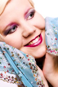 Scarves can be fashionable and camouflage scars.