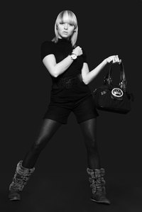 The length of the bag handles determines whether or not it can be worn over the shoulder.