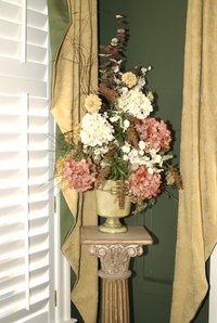 A decorative pedestal gives you a place to showcase your personal artistic treasures.