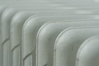 Hot water heat provided by a radiator can be more cost effective than forced air heat.
