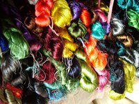Artists and crafters create beautiful and practical art with looms.
