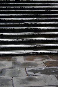 Slate tile transforms boring steps into a work of art.