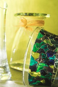 Tempera paint gives an opaque quality to a glass piece.