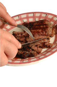 Tough chuck steaks become tender with braising.
