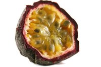 The color of the passion fruit's rind indicates whether the flower closes before or after noon.