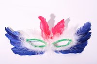 Add colorful masks to help enhance your mythical creature theme.