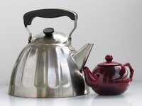 Sterling silver teapots add a touch of class to the kitchen.