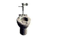 The flushometer differs from the handle on a residential toilet.