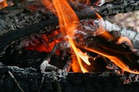 Enjoy the warmth of a fire on a scenic hill by building a fire pit.