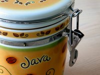 Opaque jars with latches and rubber gaskets seal out air and light.